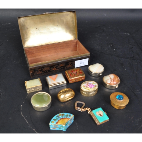 806 - A 20th century Niello brass inlaid casket box together with a collection of small brass and gilt met... 