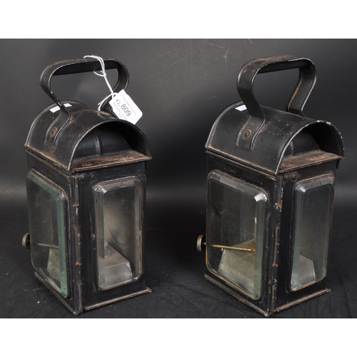 809 - A pair of early 20th century carriage lamps by Raydyot. Eact lamp retaining original black paintwork... 