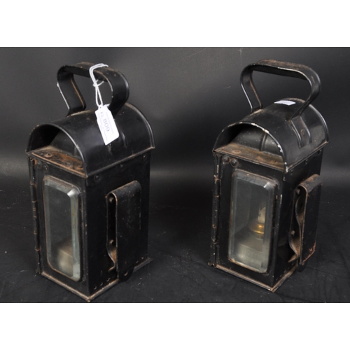 809 - A pair of early 20th century carriage lamps by Raydyot. Eact lamp retaining original black paintwork... 