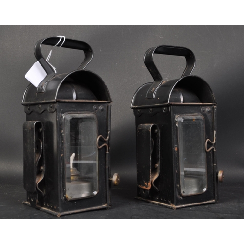 809 - A pair of early 20th century carriage lamps by Raydyot. Eact lamp retaining original black paintwork... 