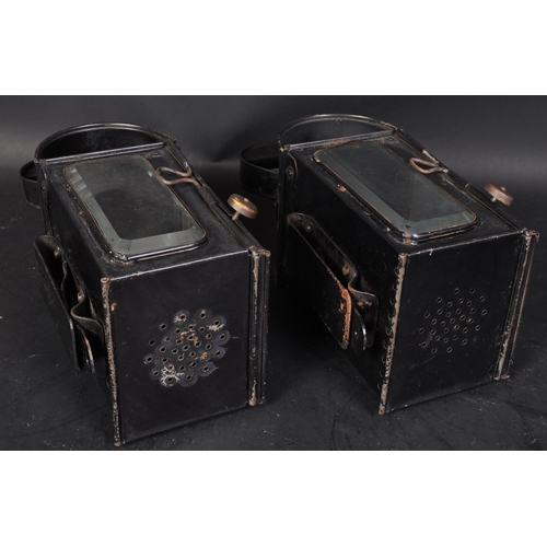 809 - A pair of early 20th century carriage lamps by Raydyot. Eact lamp retaining original black paintwork... 