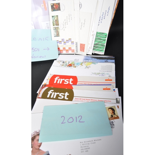 1129 - A collection of 21st Century first day cover stamps. From various years and including; Charles Dicke... 