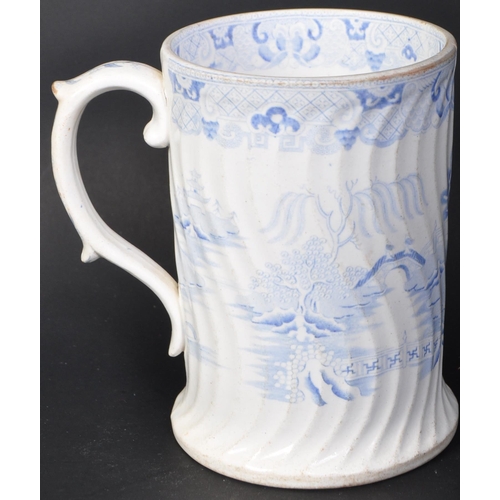 704 - An early 19th century George III believed Swansea pottery ceramic one pint mug. The cup having a in ... 