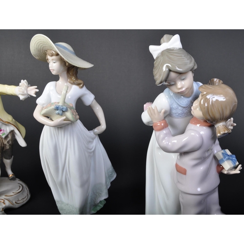 707 - An assortment of 20th century Dresden German porcelain lace figurines comprising of a couple dancing... 