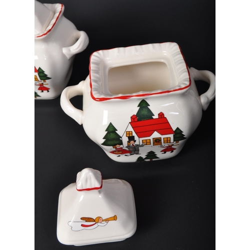 708 - Four late 20th century Mason's Ironstone 'Christmas Village' ceramic lidded pots. Each pot having tw... 