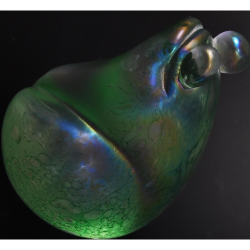 712 - A vintage 20th century John Ditchfield for Glasform iridescent glass frog shaped paperweight in a gr... 