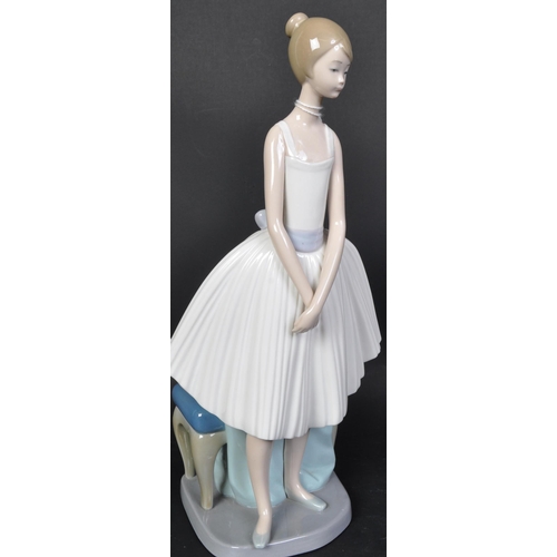 767 - An assortment of vintage 20th century Nao by Lladro Spanish porcelain figurines. The lot to include ... 