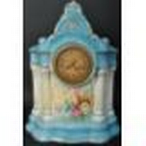 798 - An early 20th century Staffordshire porcelain mantel clock. Inset barrel 8-day movement with champag... 