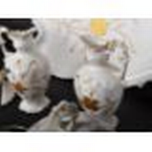 799 - Manner of Limoges porcelain - An early 20th century white glazed and gilt embellished hand painted d... 