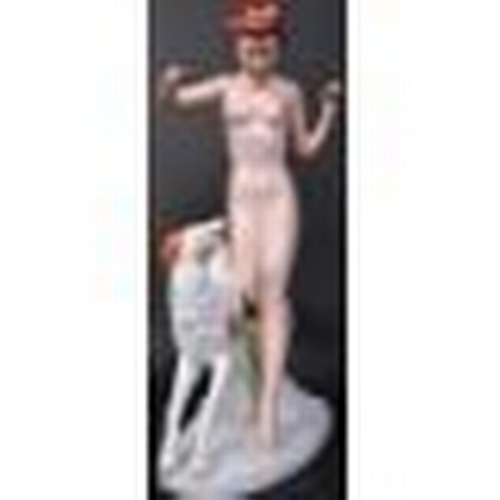 723 - An early 20th century Art Deco circa 1930s Royal Dux style porcelain figure of Diana the Huntress wi... 