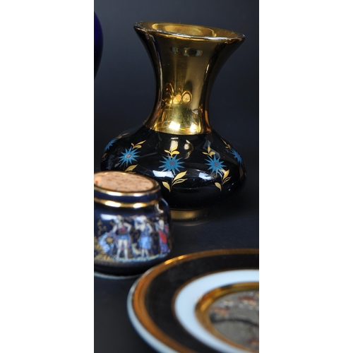 669 - An assortment of vintage late 20th century Greek 24k gold ceramic items. The lot to include a narrow... 