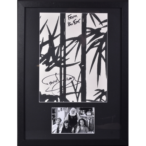 122 - Only Fools & Horses - Trotter Flat - a framed display featuring an autographed segment of wallpaper,... 