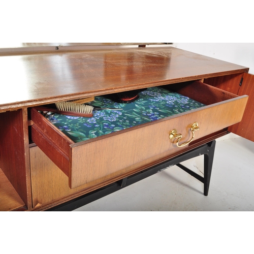 1150 - British Modern Design - Mid century teak wood dressing table chest. Raised on ebonised teak suspensi... 