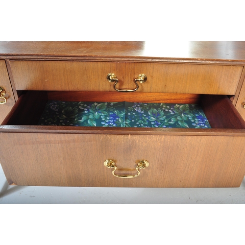 1150 - British Modern Design - Mid century teak wood dressing table chest. Raised on ebonised teak suspensi... 