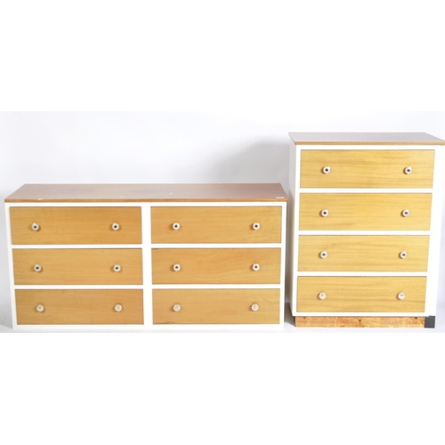 1153 - A retro vintage mid 20th Century two-tone furniture suite comprising a chest of drawers, bedside cab... 