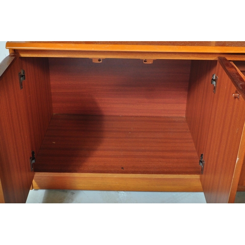 1162 - A retro vintage 20th century teak wood display cabinet / wall unit having a straight top over a glaz... 