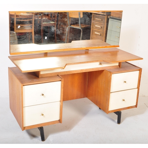 1165 - A G Plan mid 20th Century China white dressing table. (AF). The dressing table with white fronted dr... 