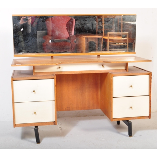 1165 - A G Plan mid 20th Century China white dressing table. (AF). The dressing table with white fronted dr... 