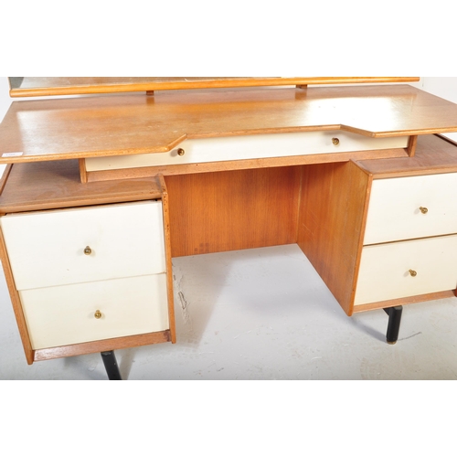 1165 - A G Plan mid 20th Century China white dressing table. (AF). The dressing table with white fronted dr... 