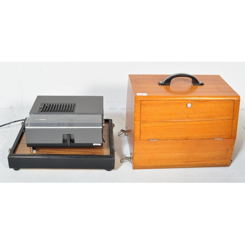 1166 - A mid 20th Century oak wood projector case being hand made with sectional top enclosing a Hanimex au... 