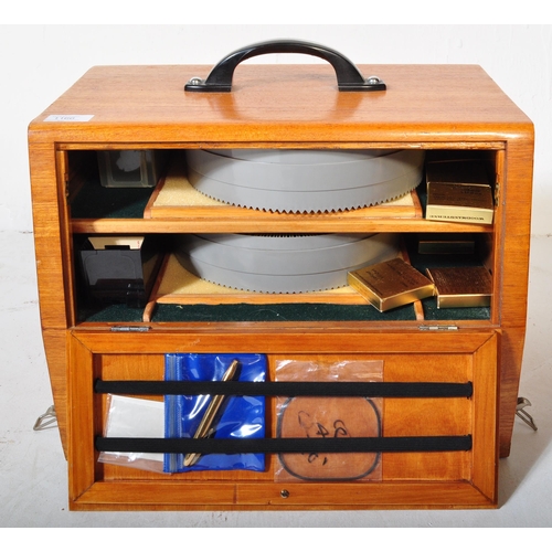 1166 - A mid 20th Century oak wood projector case being hand made with sectional top enclosing a Hanimex au... 