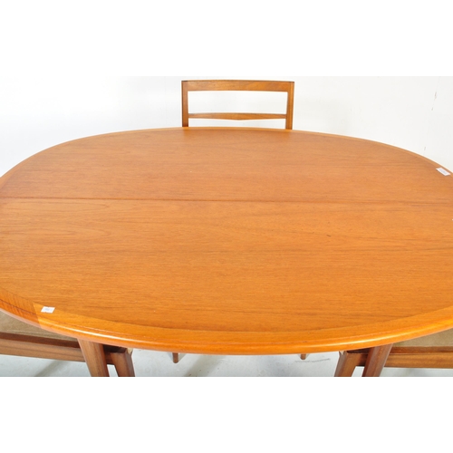 1167 - A retro vintage mid 20th Century teak wood dining table raised on tapering legs with oval extending ... 