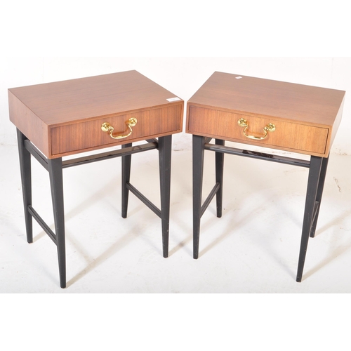 1170 - British Modern Design - A pair of mid century teak wood bedside tables. Each being raised on taperin... 