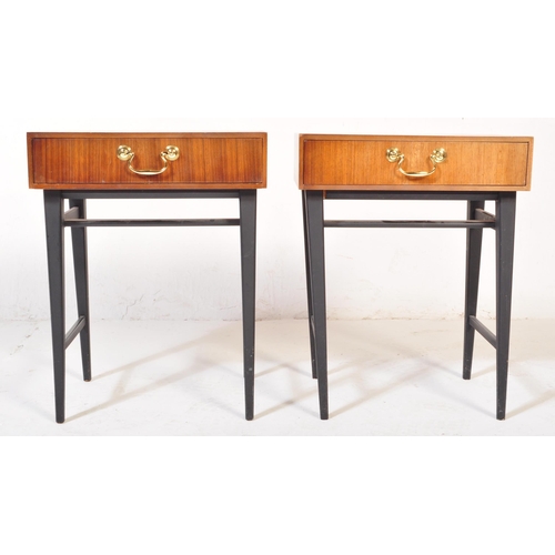 1170 - British Modern Design - A pair of mid century teak wood bedside tables. Each being raised on taperin... 