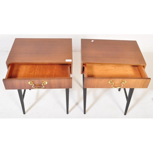 1170 - British Modern Design - A pair of mid century teak wood bedside tables. Each being raised on taperin... 