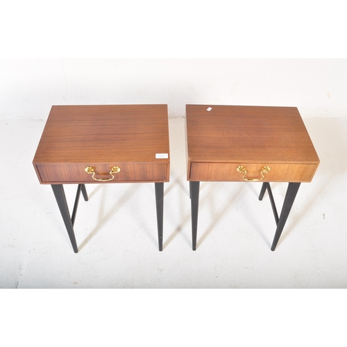 1170 - British Modern Design - A pair of mid century teak wood bedside tables. Each being raised on taperin... 