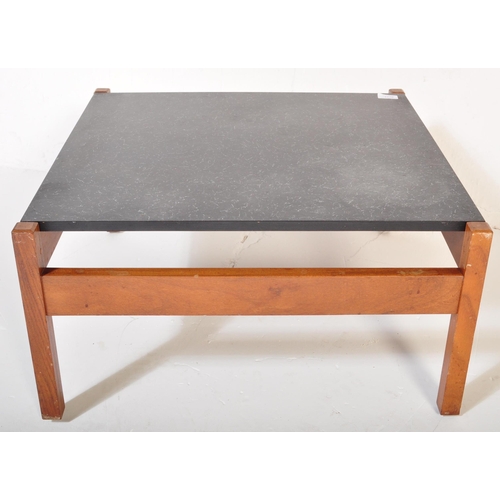 1176 - A vintage retro mid 20th century faux marble coffee table having suspended table top over squared te... 