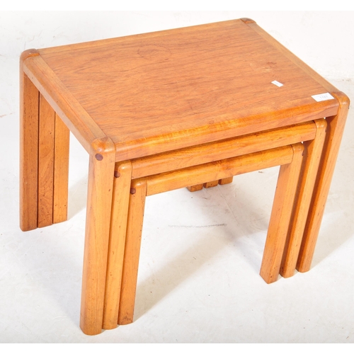 1181 - A vintage retro mid 20th century circa. 1960's teak Danish inspired nest of tables. The tables being... 