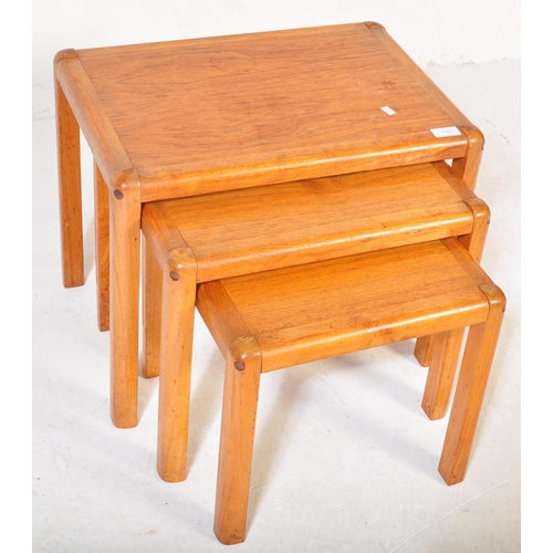 1181 - A vintage retro mid 20th century circa. 1960's teak Danish inspired nest of tables. The tables being... 