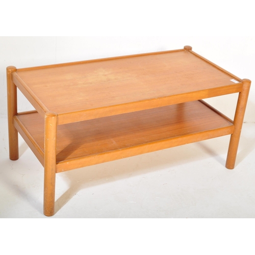 1182 - A vintage retro mid 20th century teak coffee table having rectangular under tier over cylindrical su... 