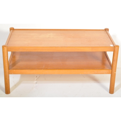 1182 - A vintage retro mid 20th century teak coffee table having rectangular under tier over cylindrical su... 