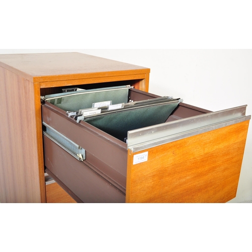 1194 - A large vintage retro mid 20th century teak wood pedestal filing cabinet having chrome handles over ... 