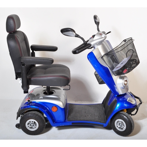 1209 - Elite - Geo 8 - Mobility scooter. With grey & blue leather seat on a chrome and metallic effect body... 