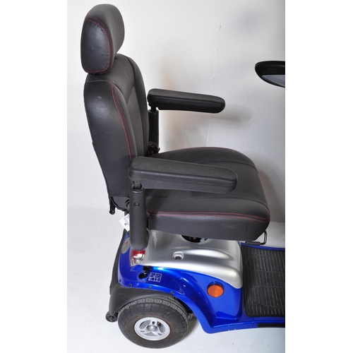 1209 - Elite - Geo 8 - Mobility scooter. With grey & blue leather seat on a chrome and metallic effect body... 