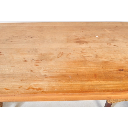 1212 - A Large contemporary pine planked refectory dining table being raised on squared legs with fitted fr... 