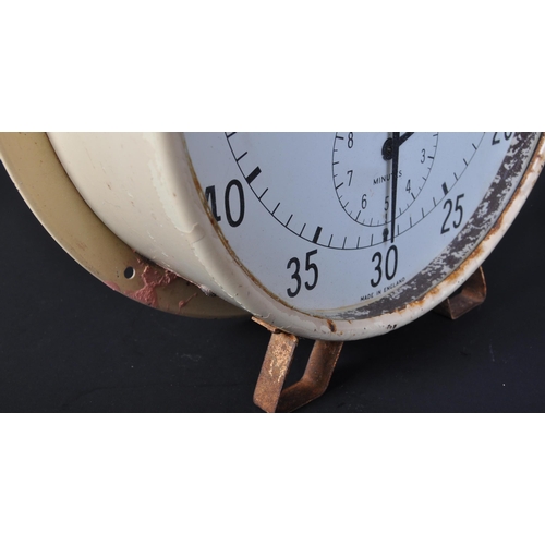 1232 - Kodak - A vintage retro mid 20th century Kodak wall mounted and table top clock of circular form in ... 