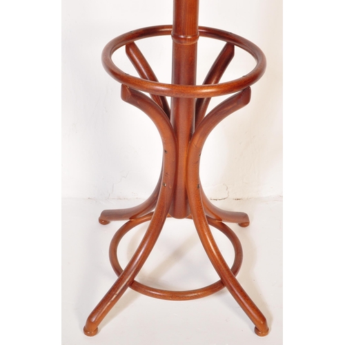 1235 - A retro vintage mid 20th Century bentwood coat stand / hat rack in the manner of Thonet. Having a ta... 