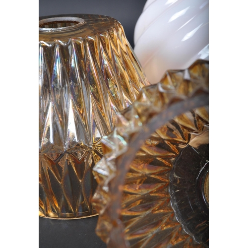 1238 - A collection of retro vintage mid 20th Century glass ceiling / wall light lamp shades. A matching pa... 