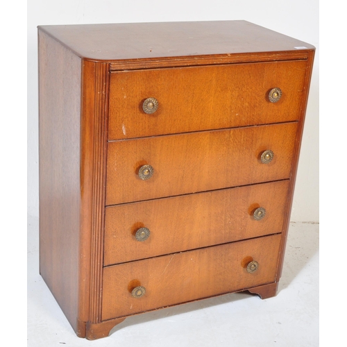 1243 - A vintage mid 20th century circa 1940s post war Art Deco style oak chest of drawers having a flared ... 