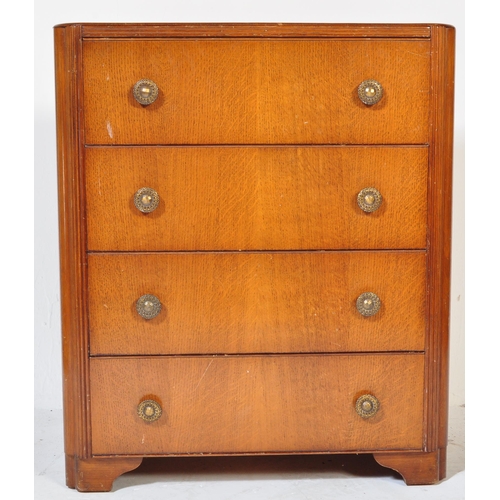 1243 - A vintage mid 20th century circa 1940s post war Art Deco style oak chest of drawers having a flared ... 