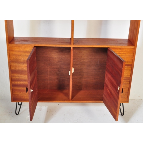 1244 - A retro vintage mid 20th Century teak wood room divider / bookcase shelving unit. Of rectangular for... 