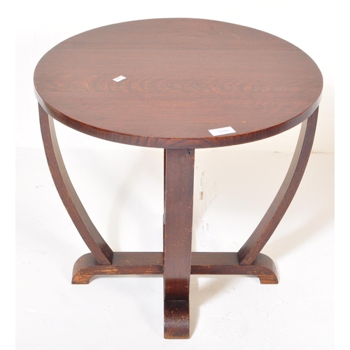 1246 - A vintage 20th Century oak Art Deco style console occasional side table. Of circular form with curve... 