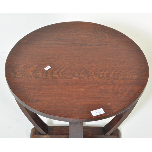 1246 - A vintage 20th Century oak Art Deco style console occasional side table. Of circular form with curve... 