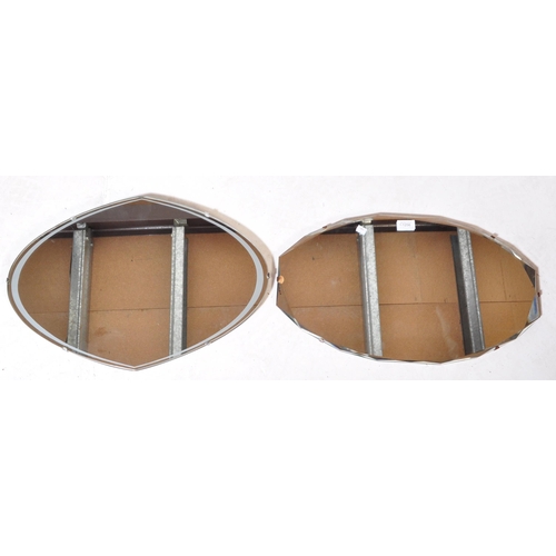 1256 - A pair of retro vintage mid 20th Century wall hanging mirrors. One having bevelled edge on wood back... 