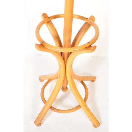 1257 - A vintage mid 20th Century Thonet bentwood coat stand rack having curved S hooks to the top over a s... 