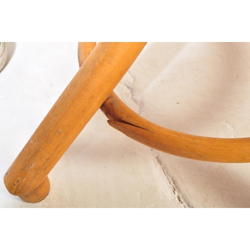 1257 - A vintage mid 20th Century Thonet bentwood coat stand rack having curved S hooks to the top over a s... 